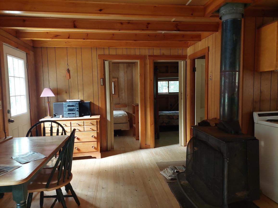 64 Chestnut Lane Rangeley, ME 04970 - Photo 13 of 36 Doors to bedrooms and bath