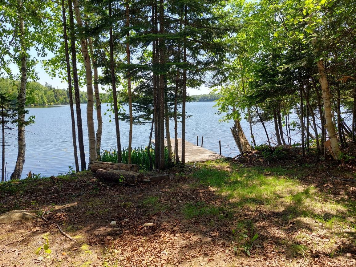64 Chestnut Lane Rangeley, ME 04970 - Photo 27 of 36 Quimby Pond and dock