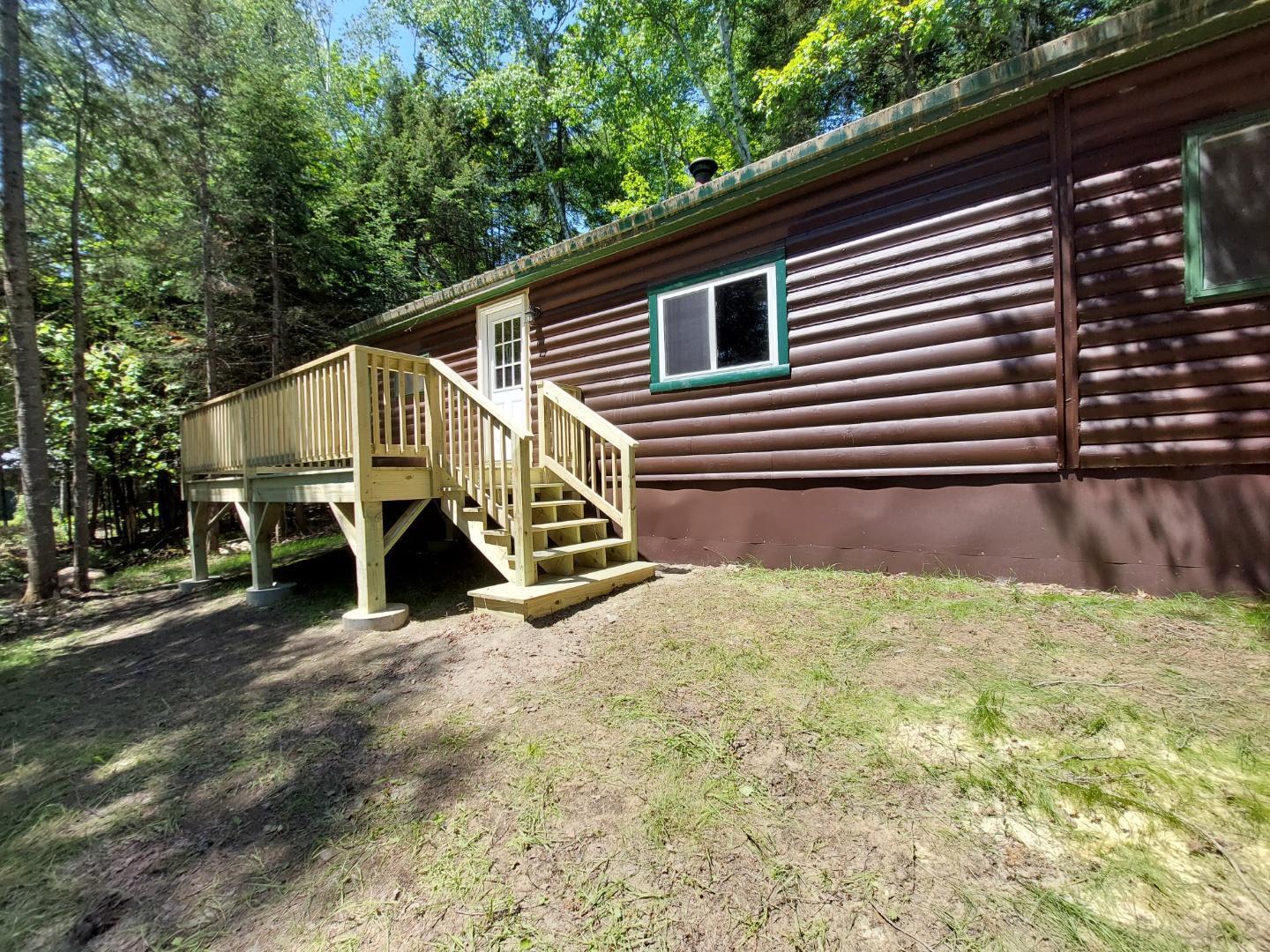64 Chestnut Lane Rangeley, ME 04970 - Photo 29 of 36 Front of camp