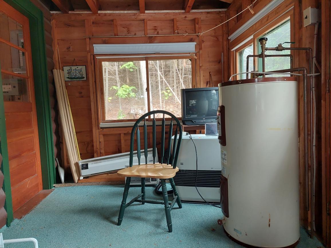 64 Chestnut Lane Rangeley, ME 04970 - Photo 30 of 36 Mudroom entrance area
