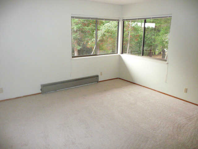 310 Rider Ridge Road Santa Cruz, CA 95065 - Photo 8 of 12 an empty room with a window