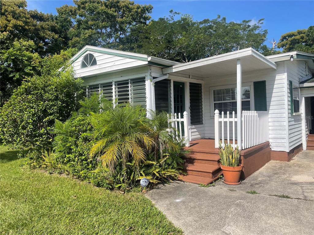1220 Culver Road Orlando, FL 32825 - Photo 1 of 1 front view of a house with a yard