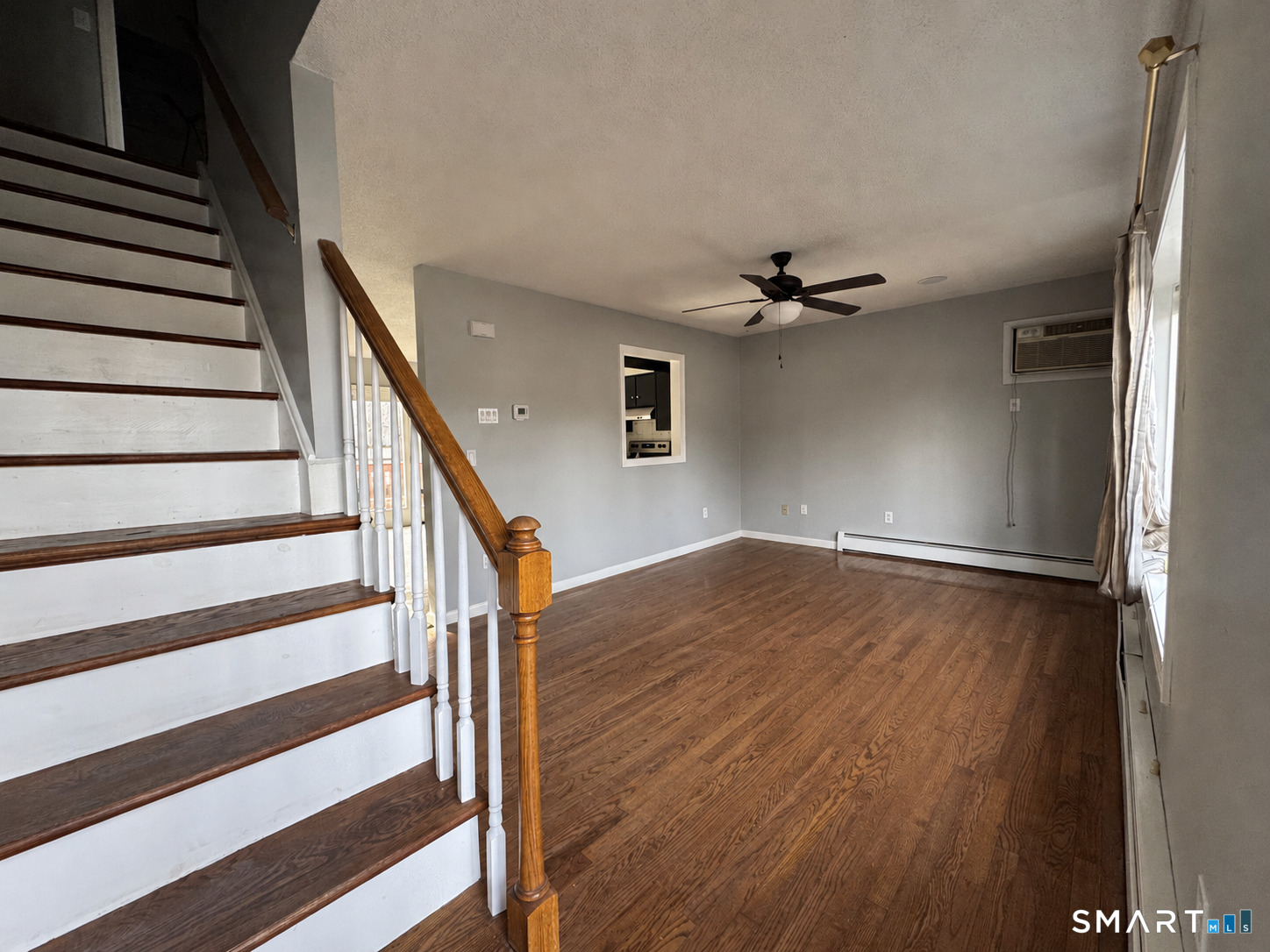 27 Katie Lane Waterbury, CT 06708 - Photo 2 of 14 a view of an entryway with wooden floor and stairs