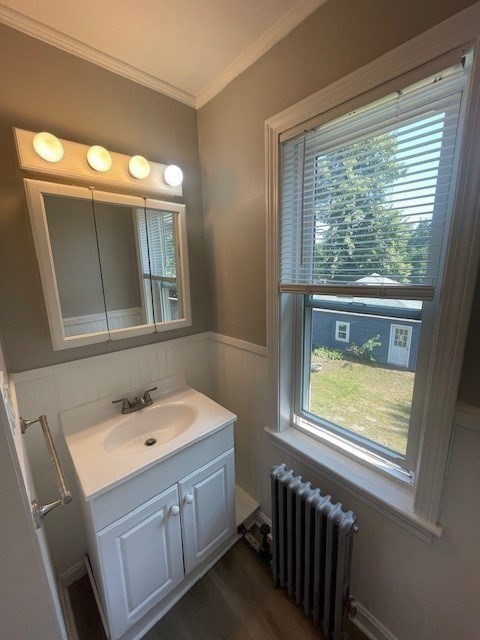 86 Margin Street, Unit 2 Haverhill, MA 01832 - Photo 21 of 28 a bathroom with a sink window and mirror