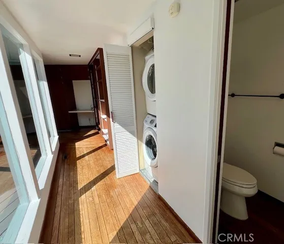 a bathroom with a sink and mirror with toilet