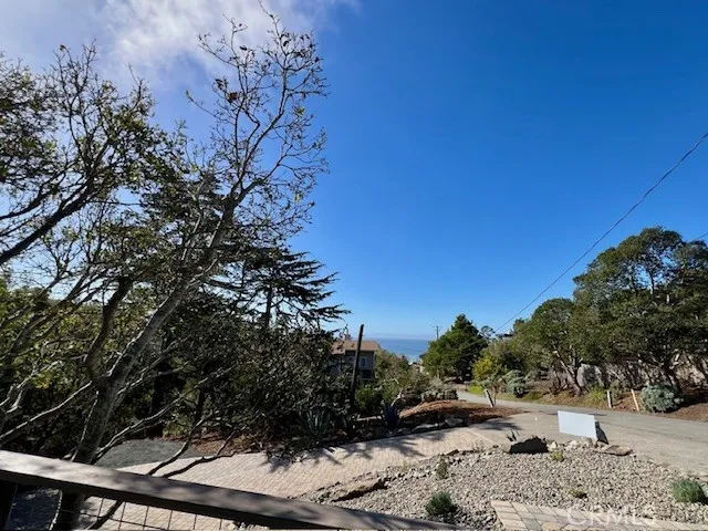 a view of a backyard of the house