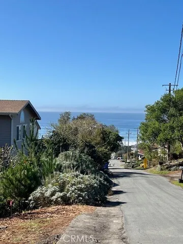 a view of a street with houses