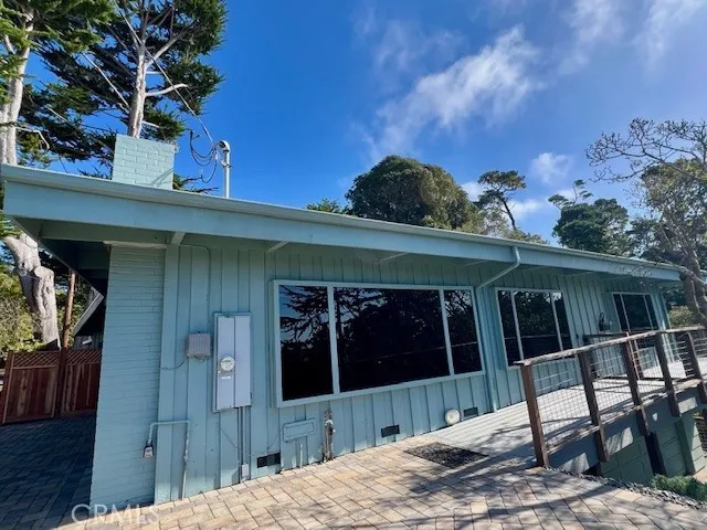 a view of a house with a balcony and porch
