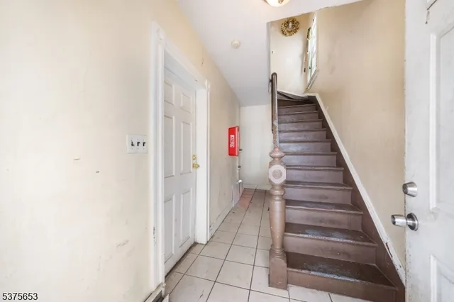 a view of a hallway with front door