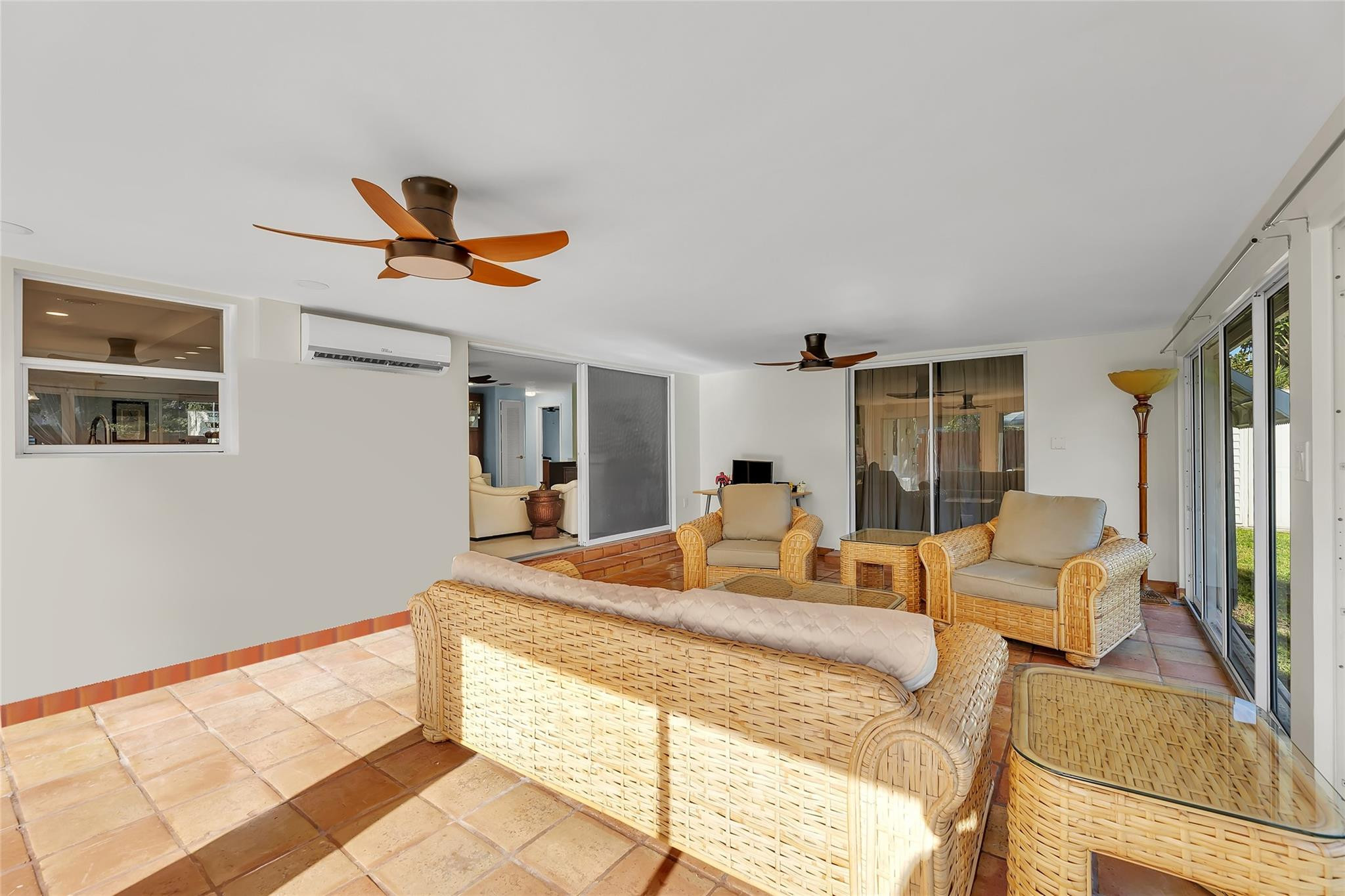 3404 Barton Road Pompano Beach, FL 33062 - Photo 30 of 46 a living room with furniture and a large window