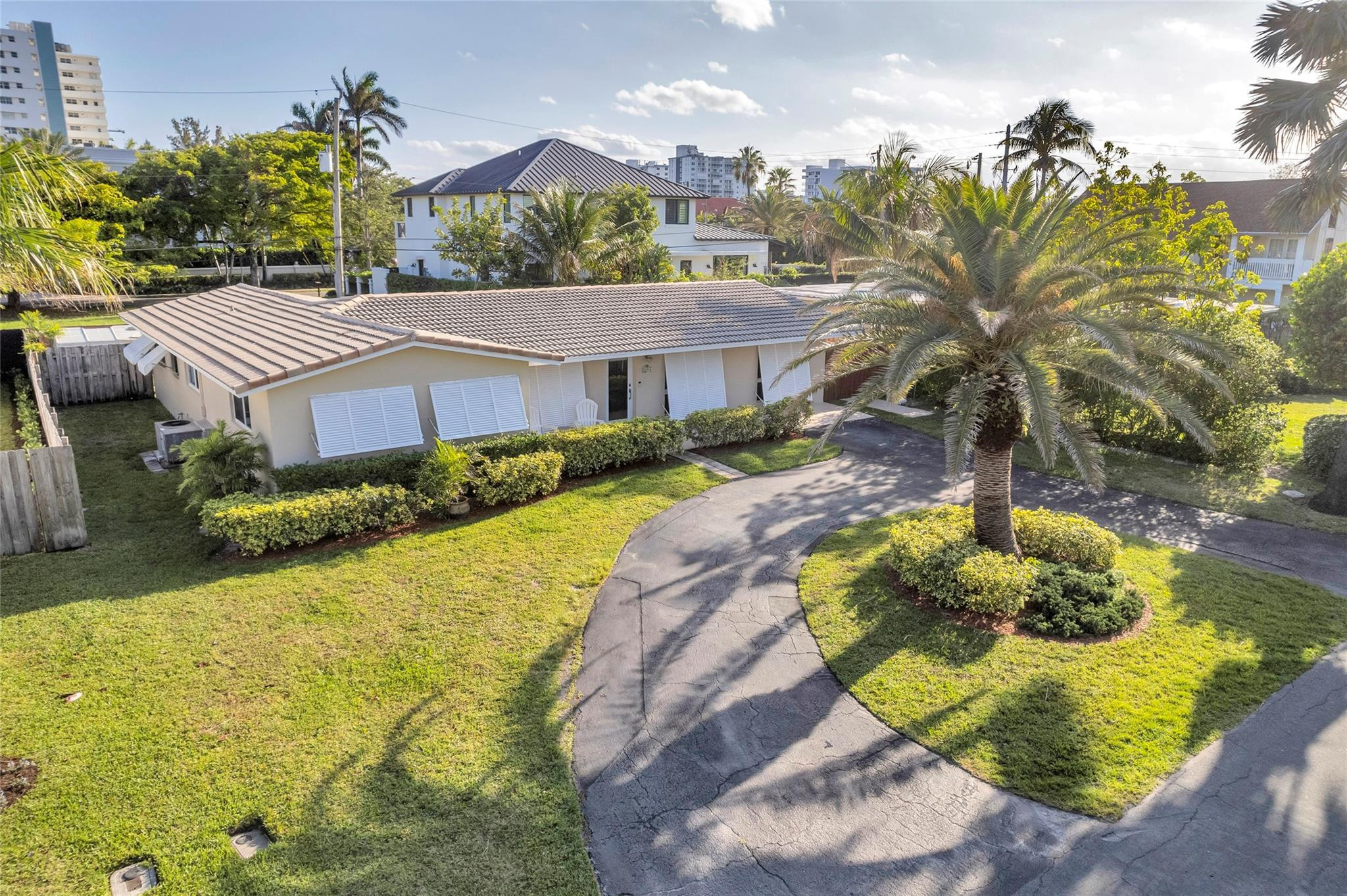 3404 Barton Road Pompano Beach, FL 33062 - Photo 42 of 46 a view of a swimming pool with a patio