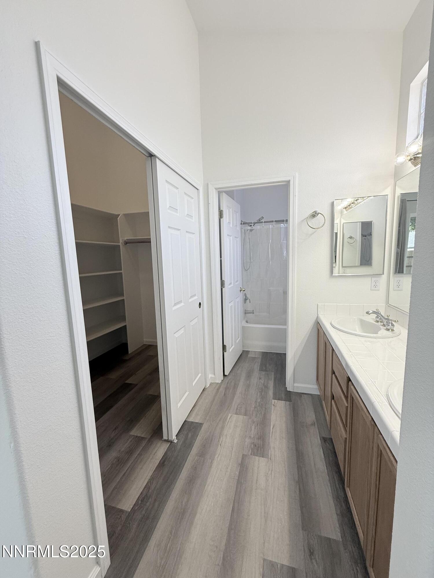 7539 Michaela Drive Reno, NV 89511 - Photo 23 of 33 a bathroom with a sink a toilet and shower