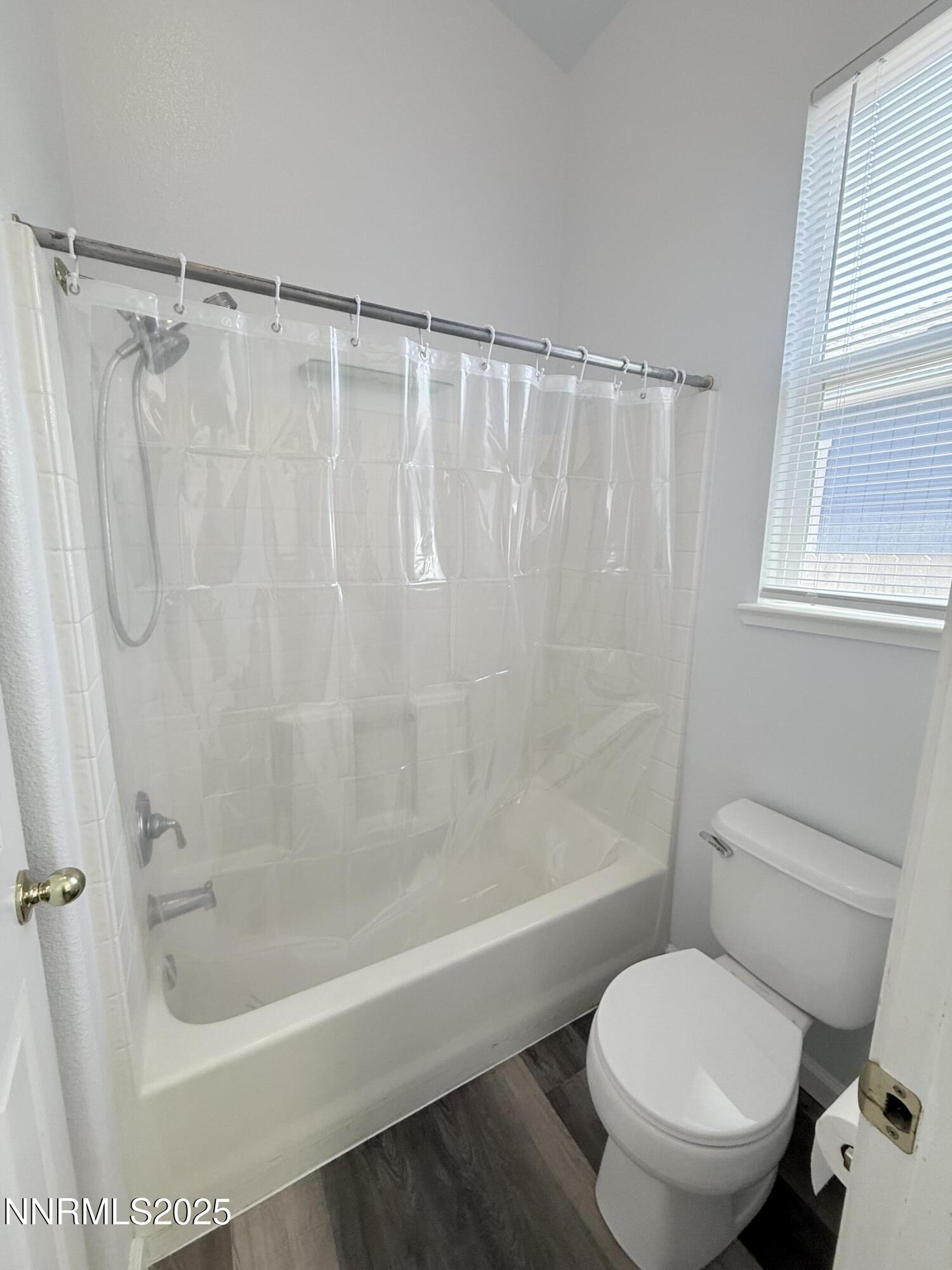 7539 Michaela Drive Reno, NV 89511 - Photo 25 of 33 a bathroom with a shower and a toilet