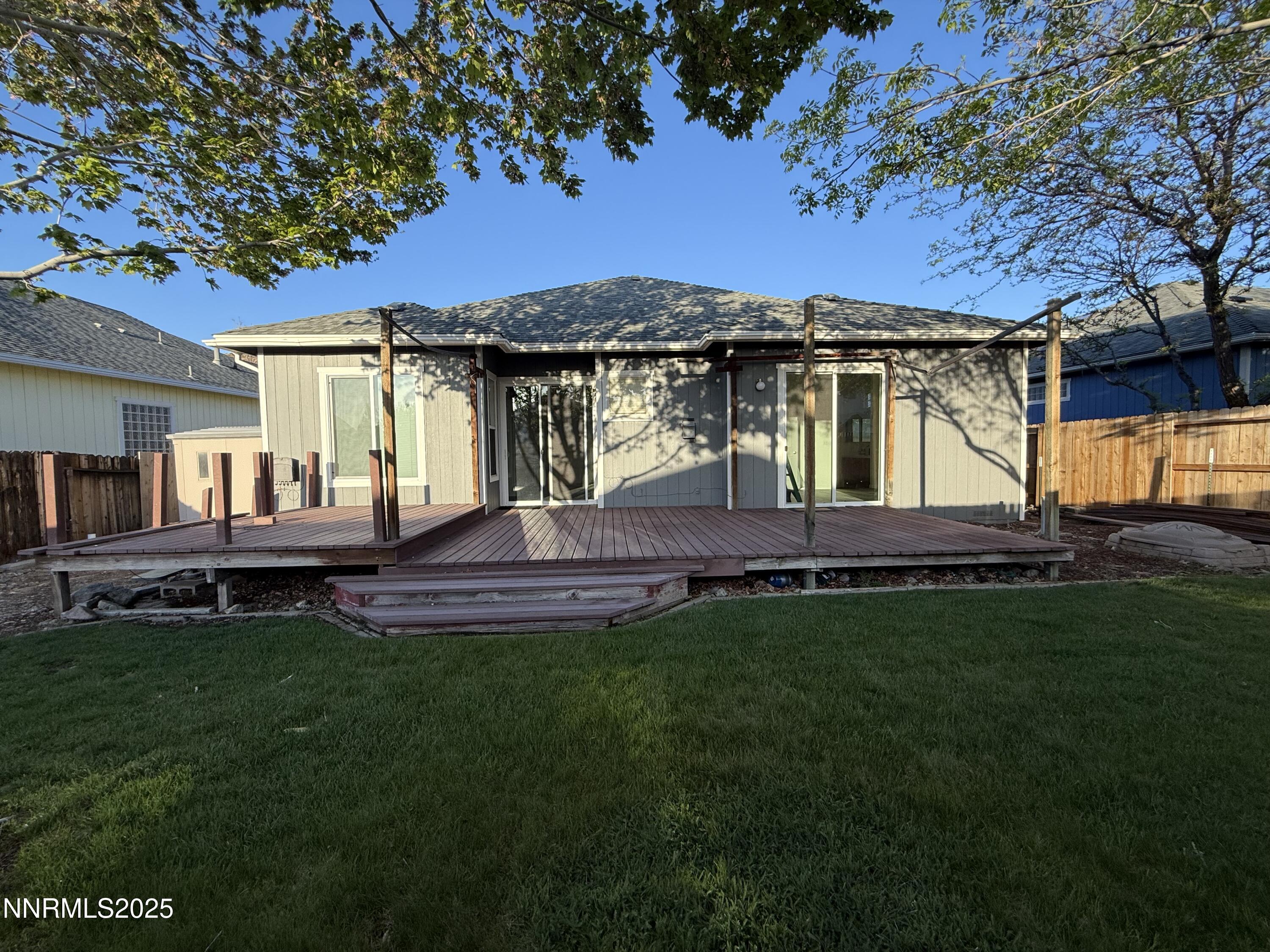 7539 Michaela Drive Reno, NV 89511 - Photo 31 of 33 a front view of a house with a garden