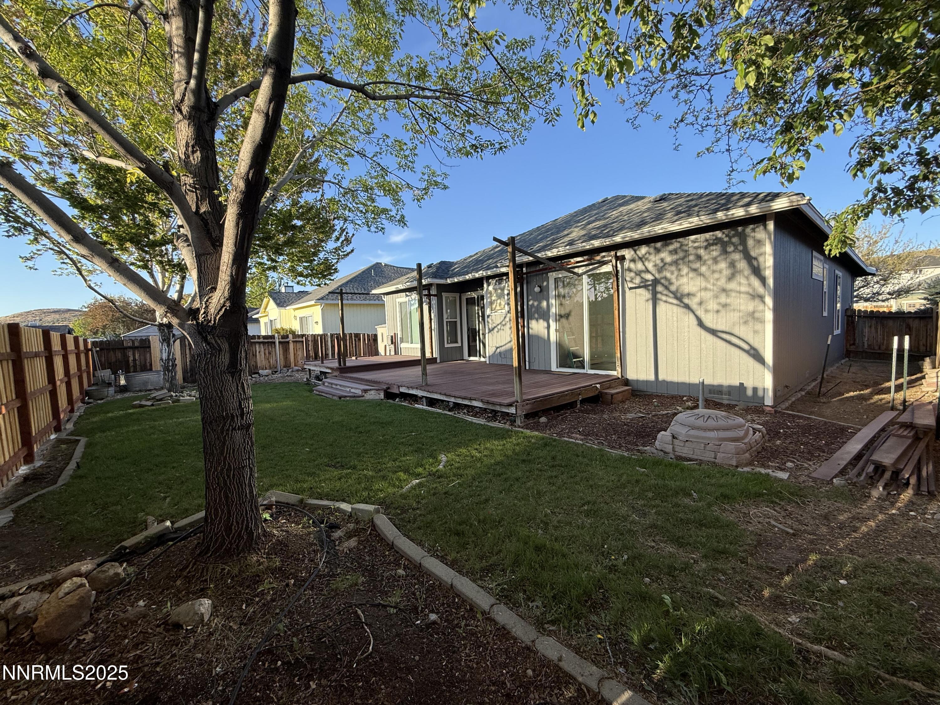 7539 Michaela Drive Reno, NV 89511 - Photo 33 of 33 a view of a back yard of the house