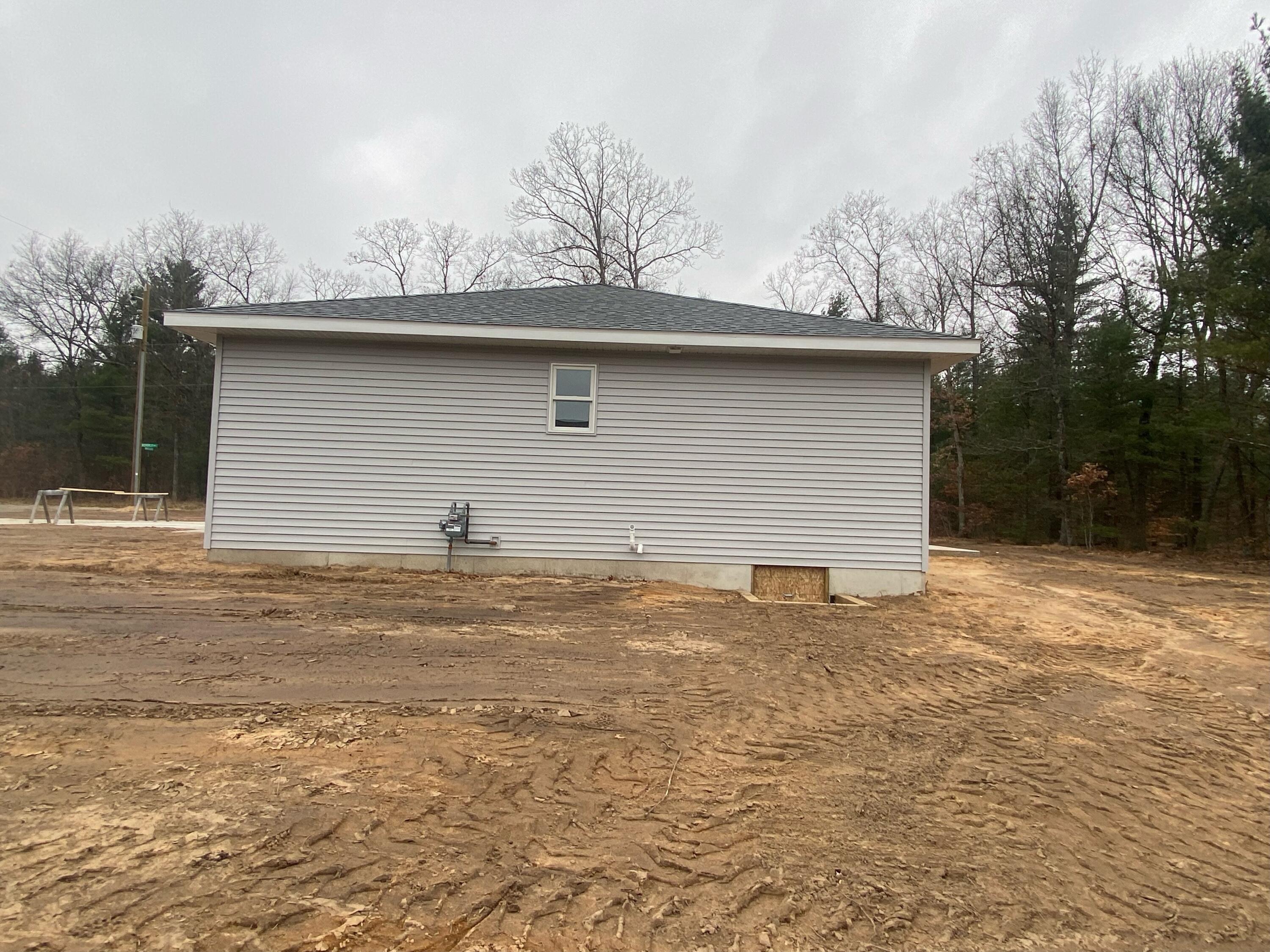 776 West Madison Road Twin Lake, MI 49457 - Photo 3 of 4 776 W Madison - East