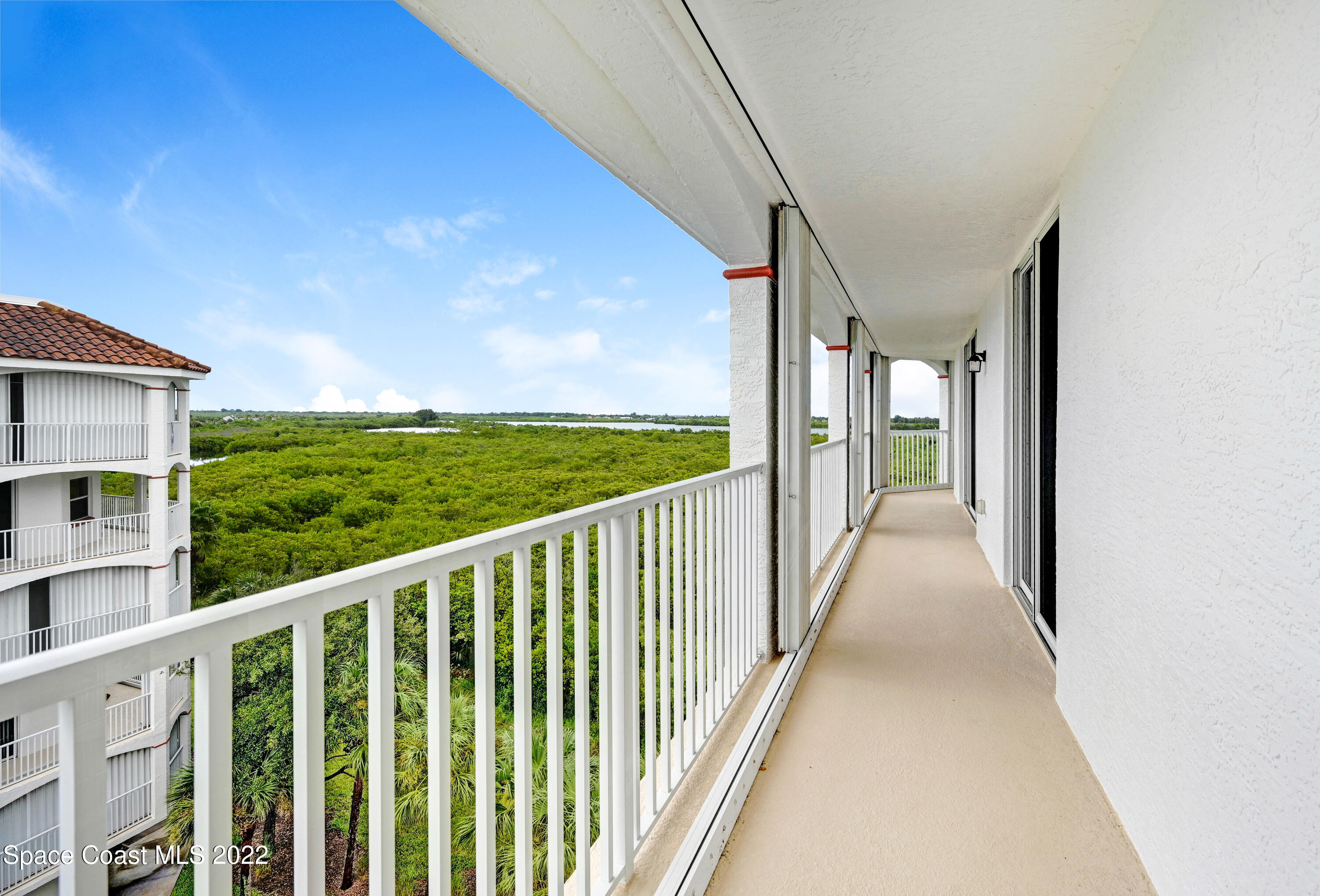 801 Del Rio Way, Unit 602 Merritt Island, FL 32953 - Photo 25 of 36 a view of a balcony with outdoor space
