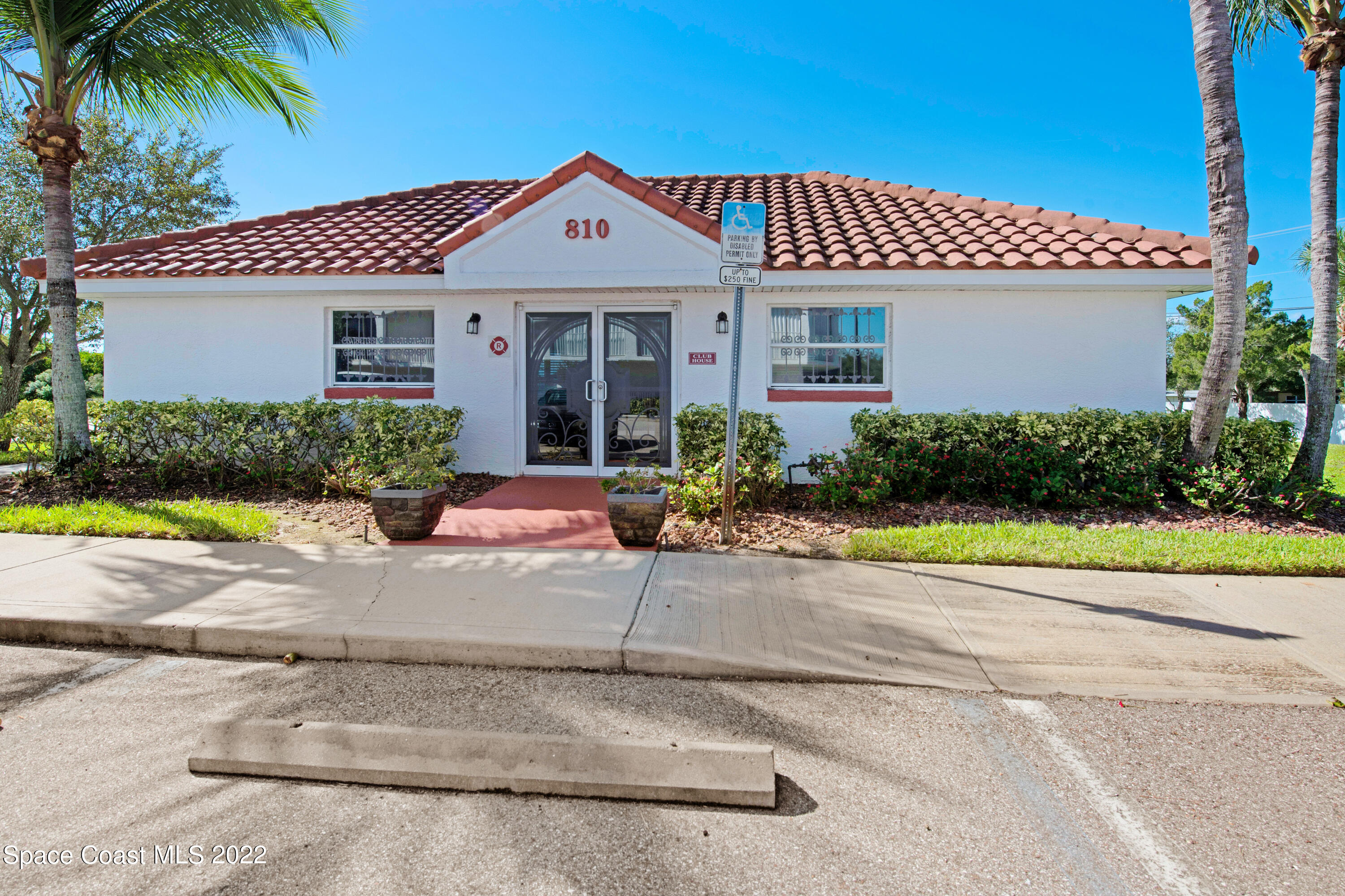 801 Del Rio Way, Unit 602 Merritt Island, FL 32953 - Photo 28 of 36 front view of a house with a yard
