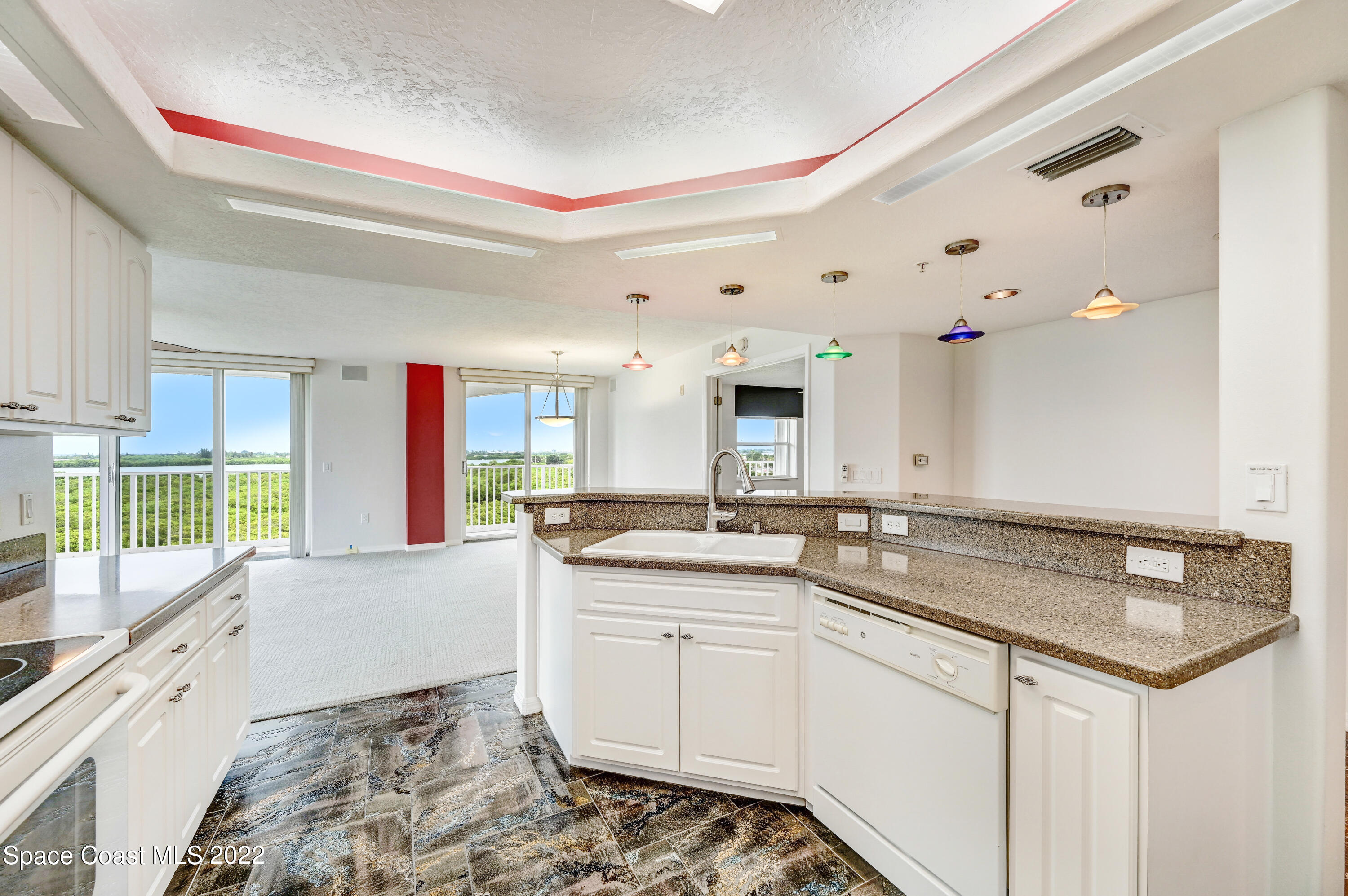 801 Del Rio Way, Unit 602 Merritt Island, FL 32953 - Photo 6 of 36 a spacious bathroom with a sink and a mirror