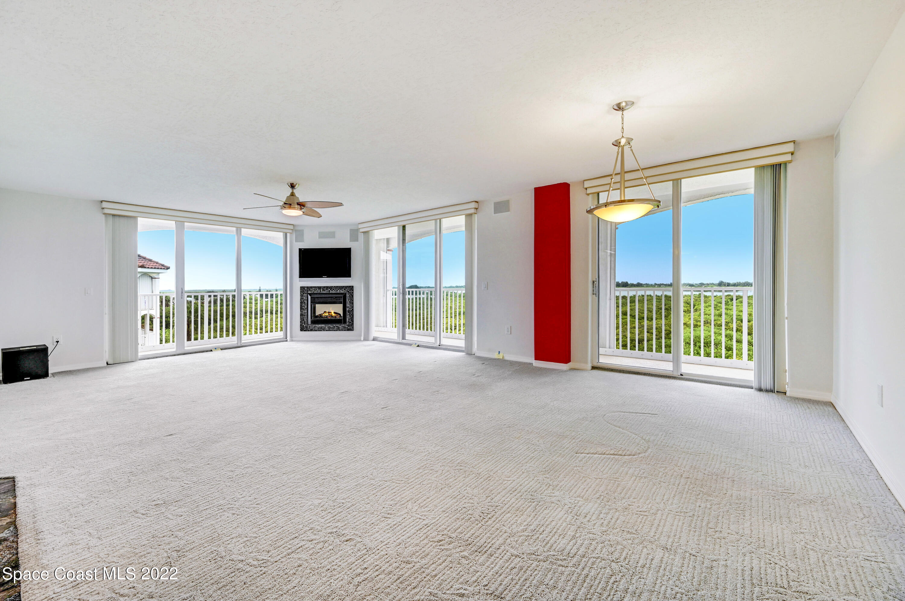 801 Del Rio Way, Unit 602 Merritt Island, FL 32953 - Photo 10 of 36 a view of livingroom with furniture and fireplace