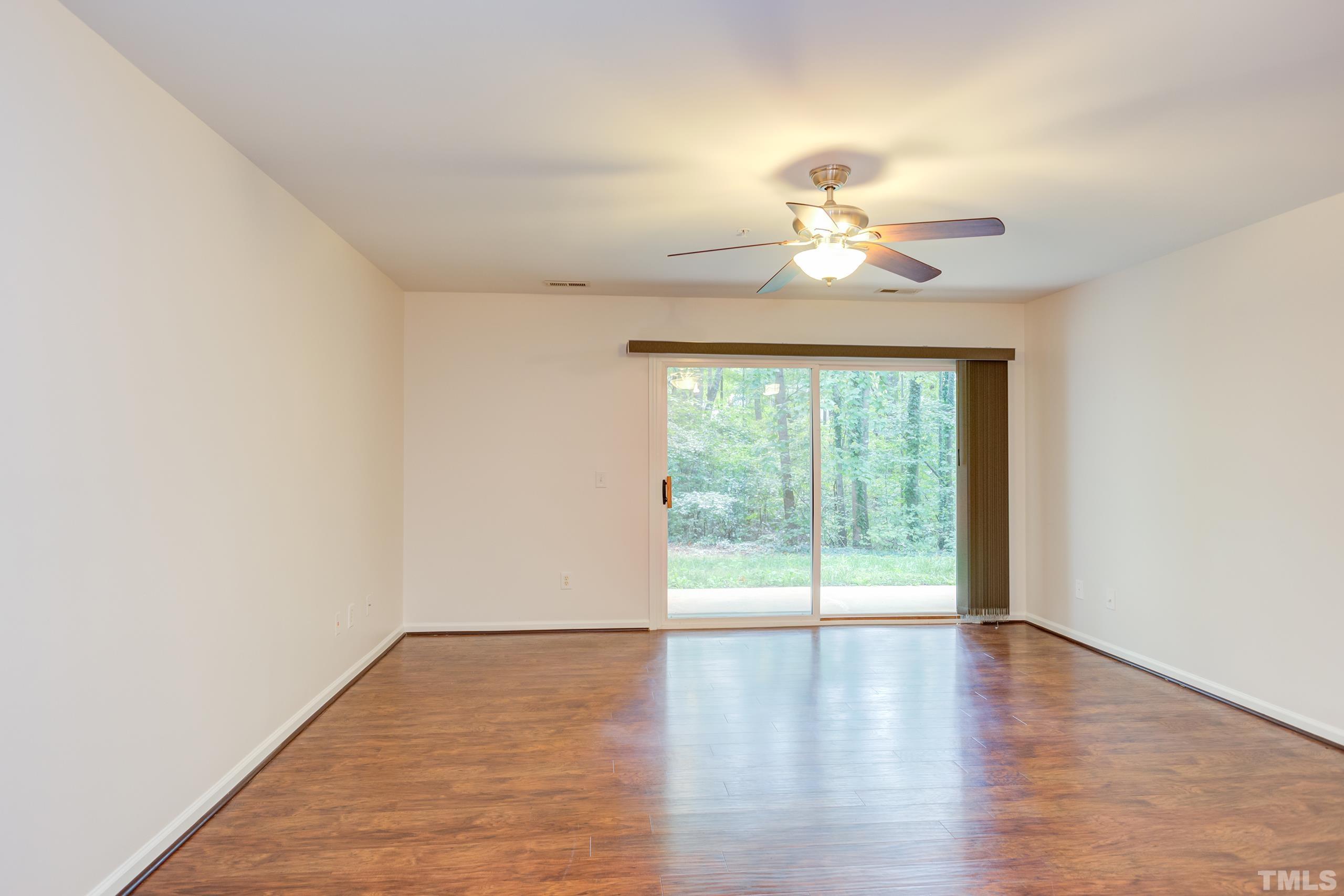 2801 Trailwood Pines Lane, Unit 102 Raleigh, NC 27603 - Photo 6 of 27 a window in an empty room