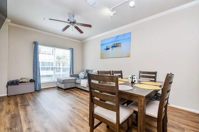 a view of a livingroom with furniture and a window