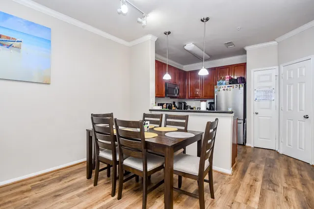 a view of a dining room with furniture