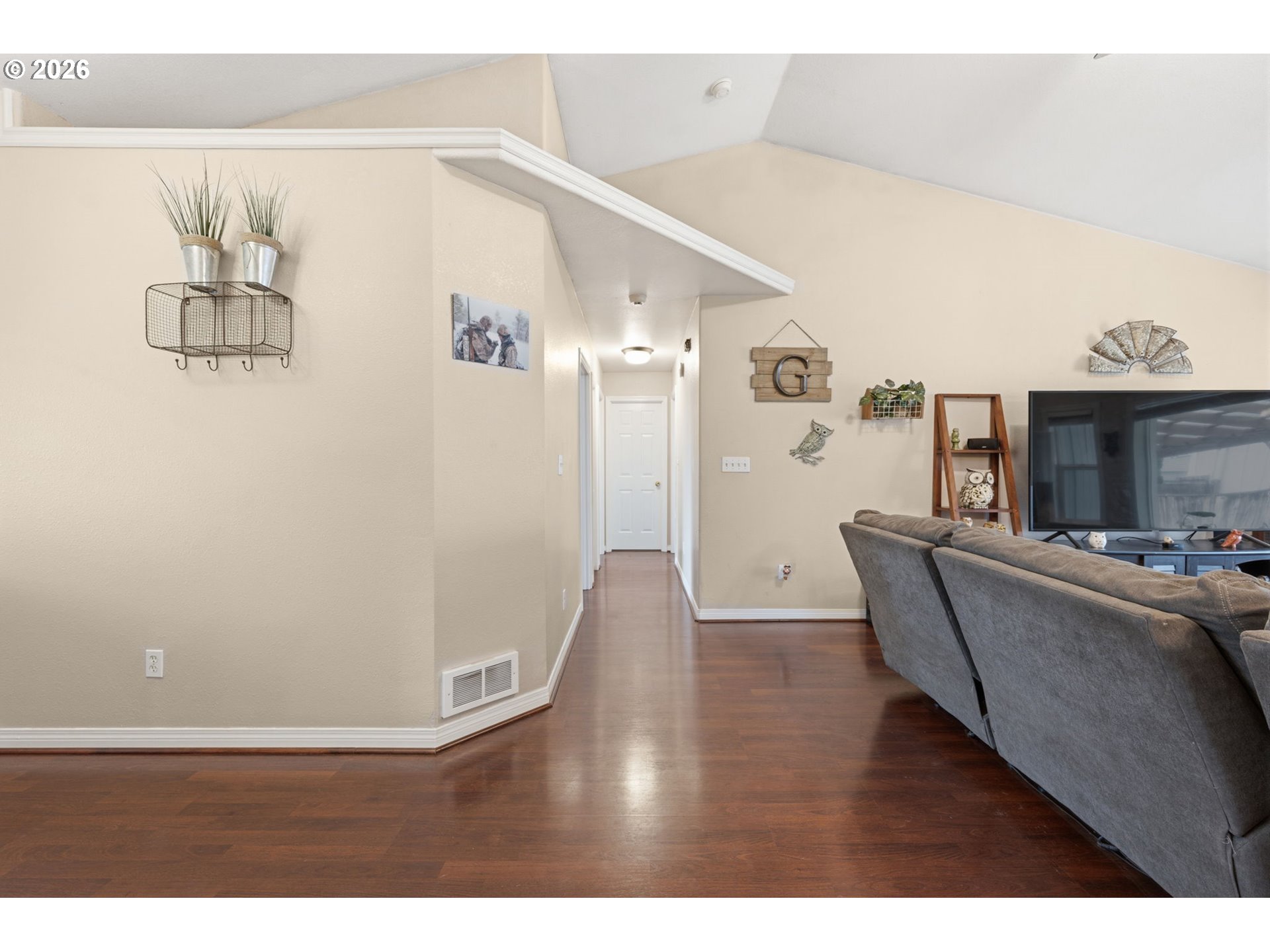 3653 Willowbrook Street Eugene, OR 97404 - Photo 23 of 43 a living room with furniture and a wooden floor