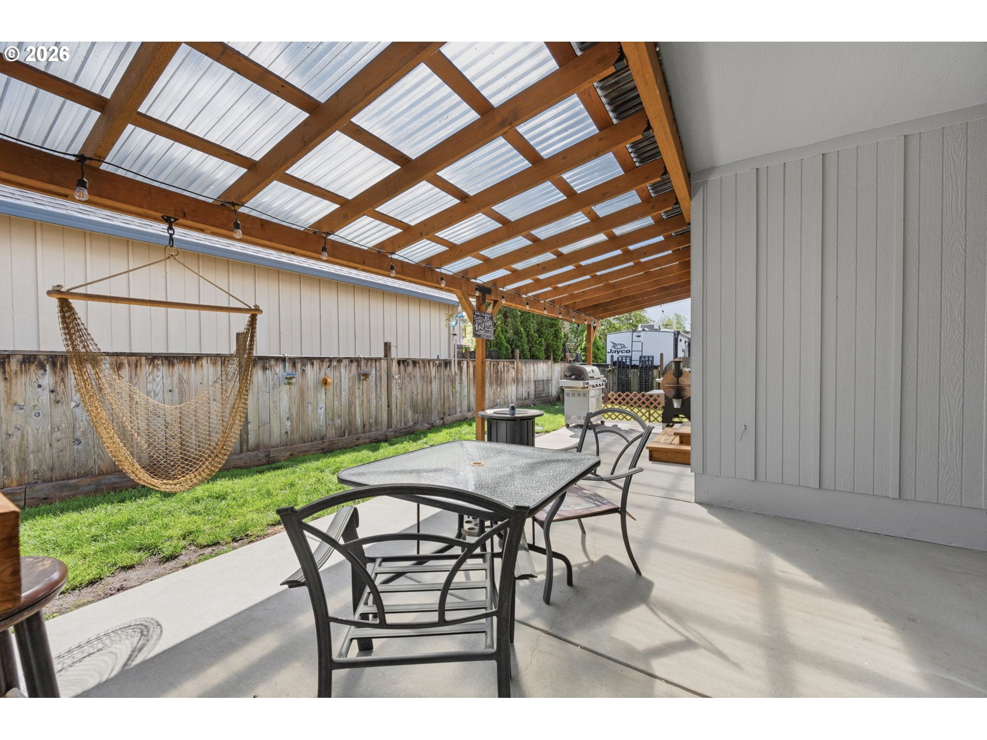 3653 Willowbrook Street Eugene, OR 97404 - Photo 35 of 43 a patio with table and chairs