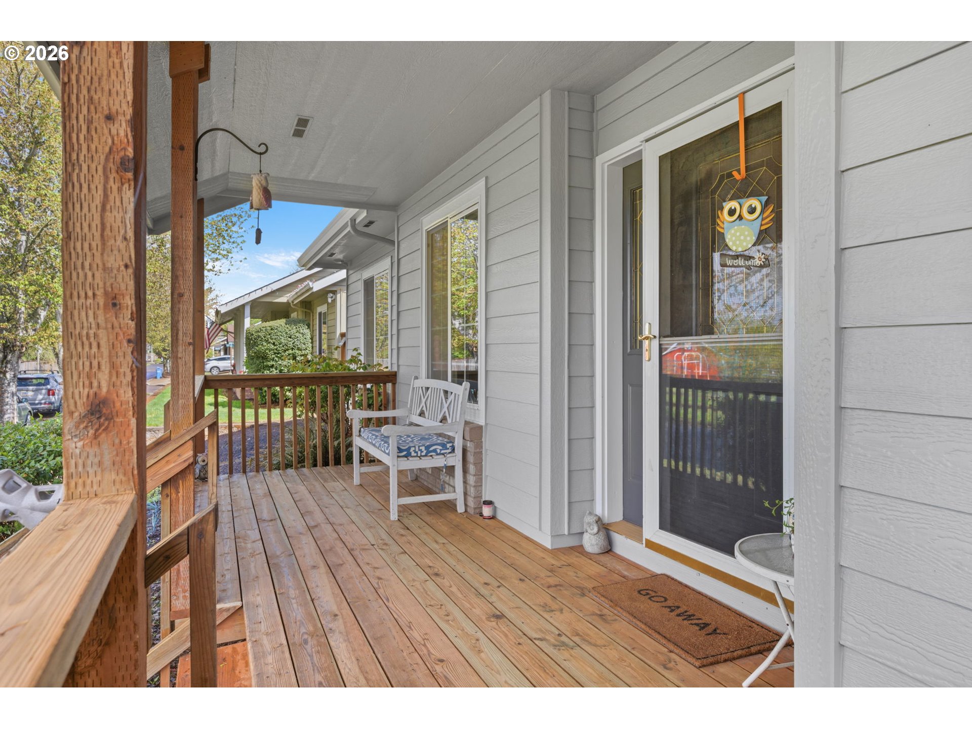 3653 Willowbrook Street Eugene, OR 97404 - Photo 41 of 43 a balcony with furniture and wooden floor