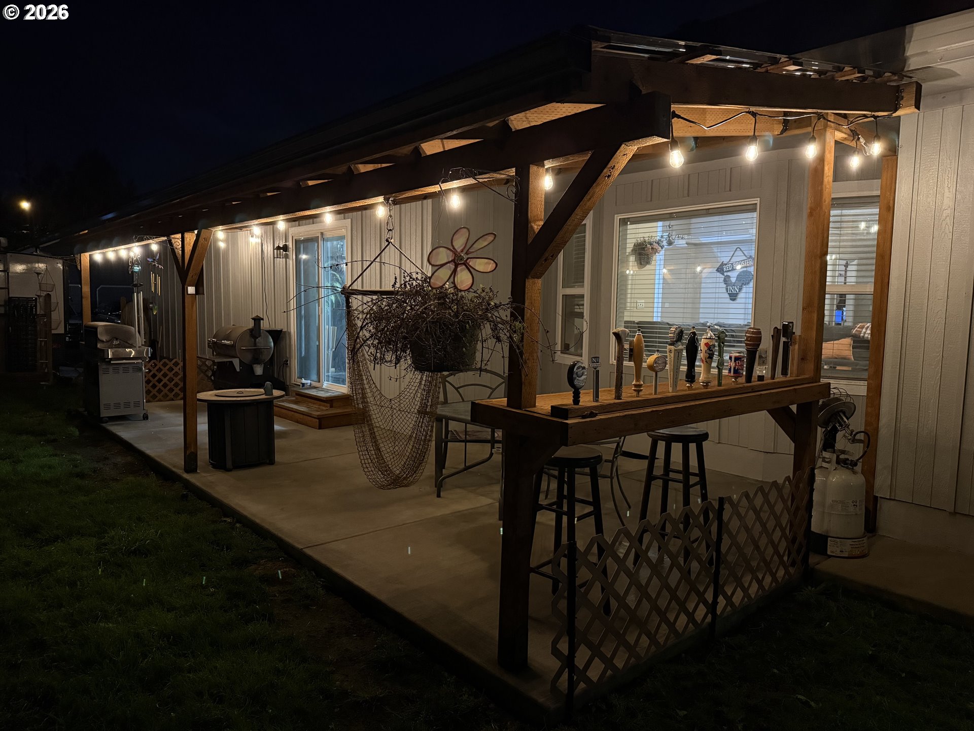 3653 Willowbrook Street Eugene, OR 97404 - Photo 42 of 43 a view of a porch with dining table and chairs