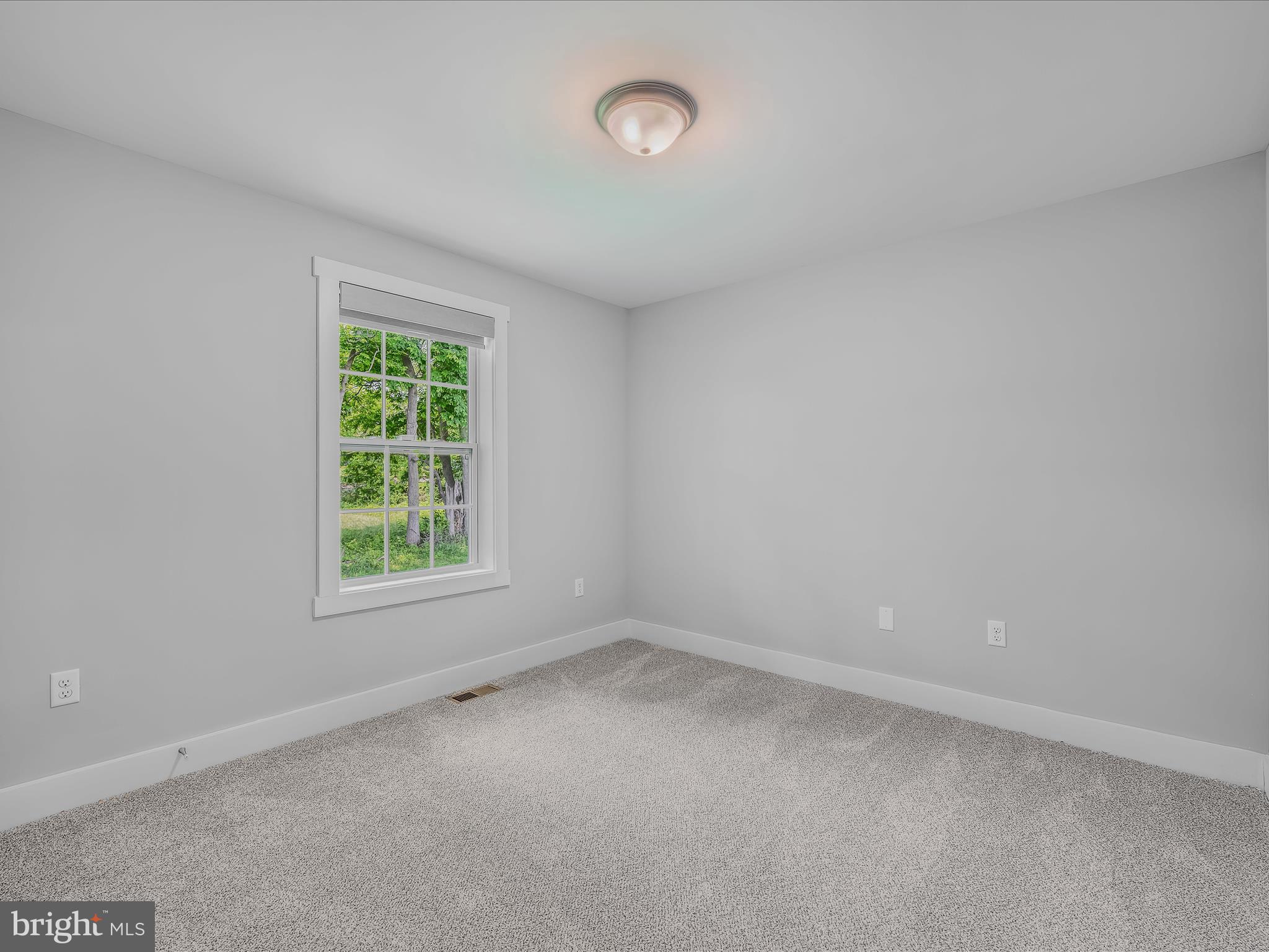 118 Fox Lair Ln Summit Point Summit Point, WV 25446 - Photo 20 of 49 an empty room with a window