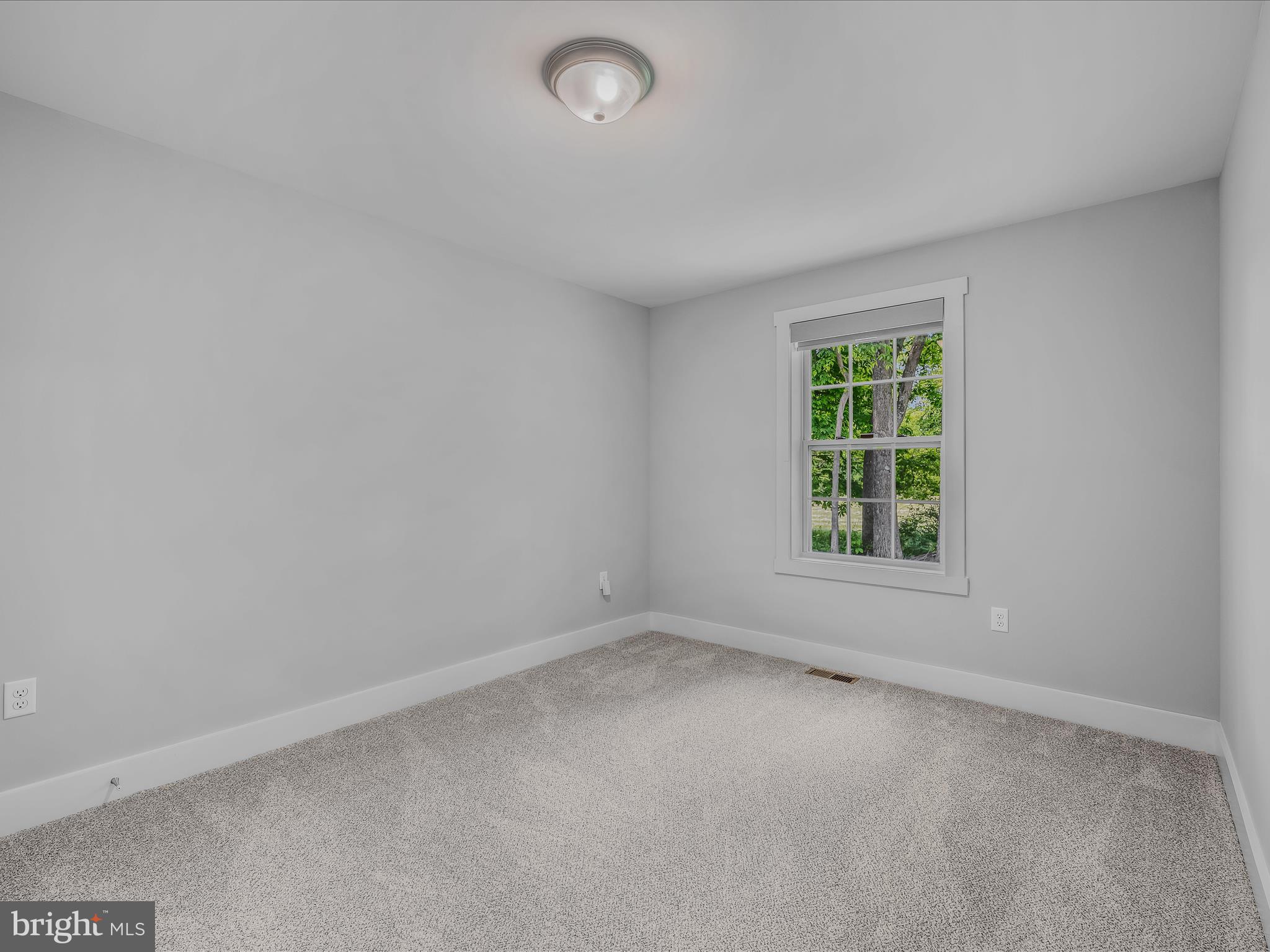 118 Fox Lair Ln Summit Point Summit Point, WV 25446 - Photo 23 of 49 an empty room with a window