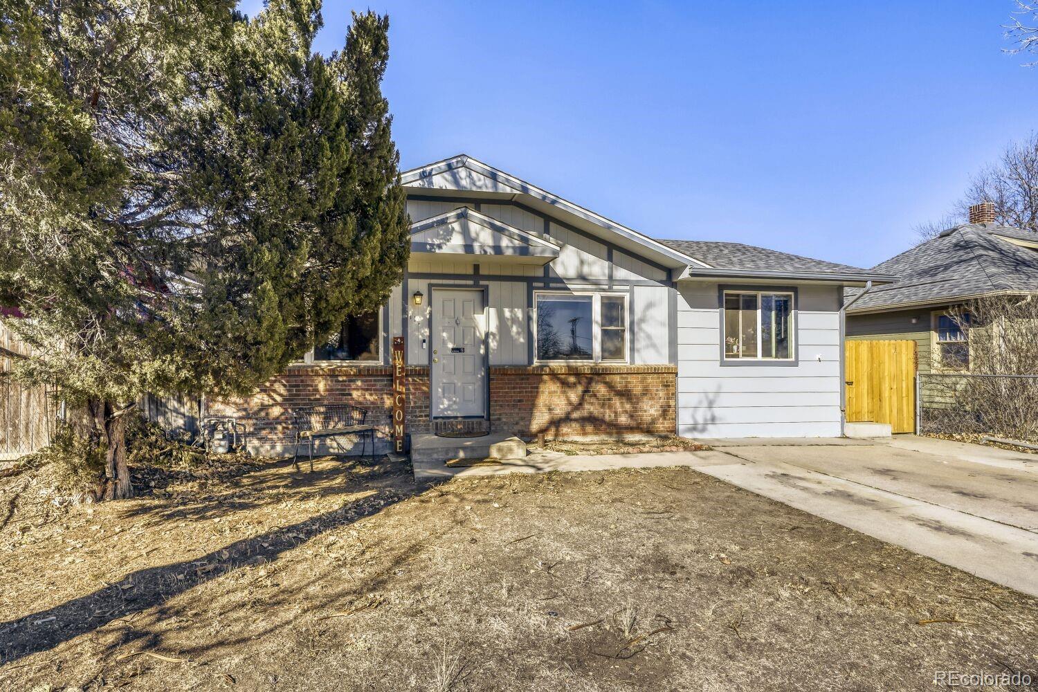111 7th Street Fort Lupton, CO 80621 - Photo 2 of 22 a view of a house with a patio