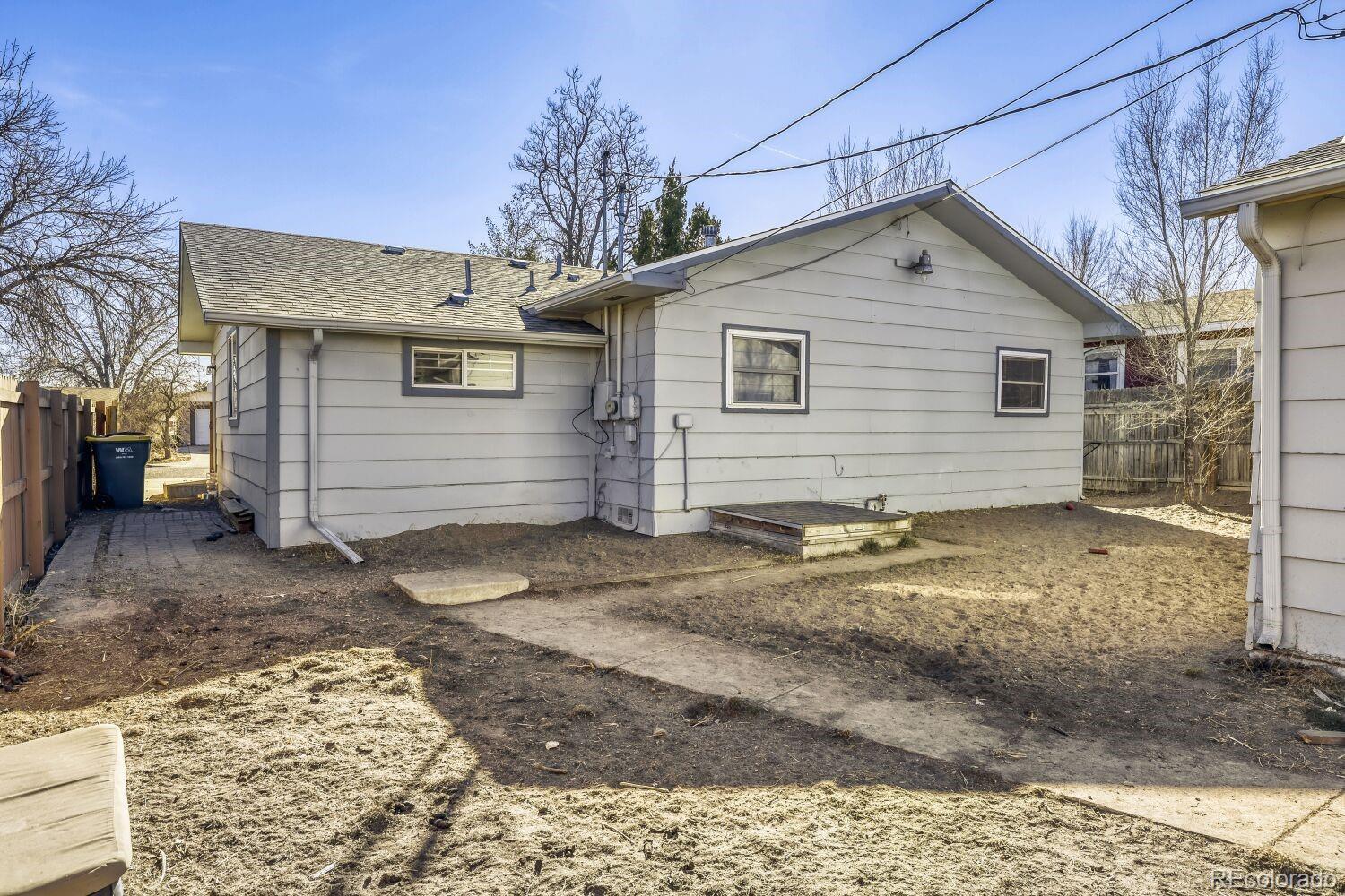 111 7th Street Fort Lupton, CO 80621 - Photo 22 of 22 a view of a house with a yard