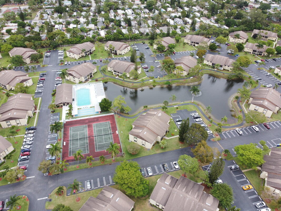 320 Pine Ridge Circle, Unit A1 Greenacres, FL 33463 - Photo 52 of 65 an aerial view of a city
