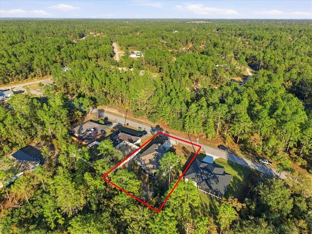 a view of a yard with an outdoor seating and mountain view