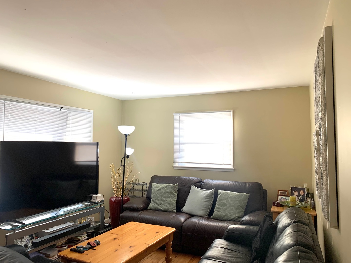 677 Walnut Road Wauconda, IL 60084 - Photo 3 of 10 a living room with furniture and a flat screen tv
