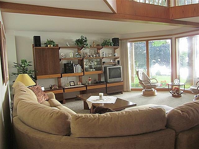 858 Breckenboro Road Lake Summerset, IL 61019 - Photo 8 of 24 a living room with furniture and floor to ceiling windows