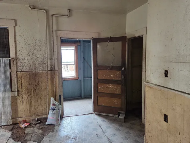 a view of elevator with window and gate