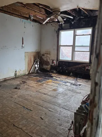 a view of a air conditioner duct and window