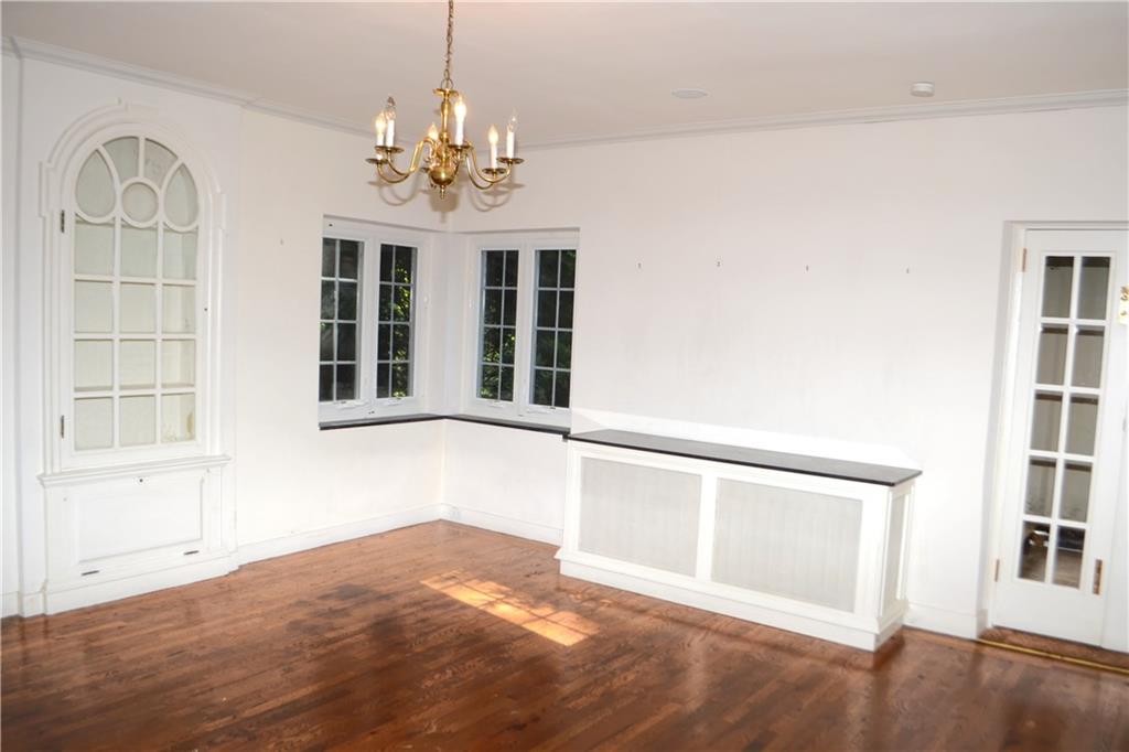 704 Chestnut Road Edgeworth, PA 15143 - Photo 8 of 25 Dining room with built-in glass front cabinet.
