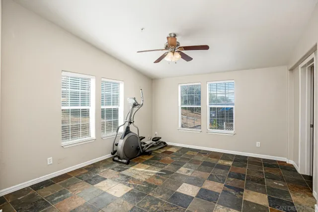 a view of a room with windows