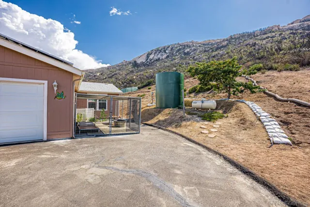 a view of a houses with a yard