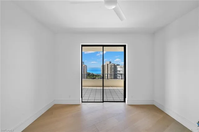 an empty room with sliding door