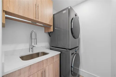 a close view of utility and utility room with washer and dryer