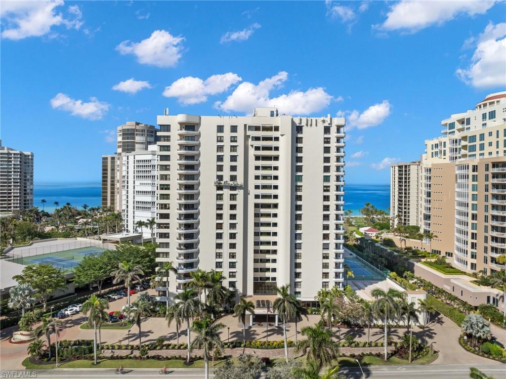 4451 Gulf Shore Boulevard North, Unit 2002 Naples, FL 34103 - Photo 32 of 36 a view of a city with tall buildings