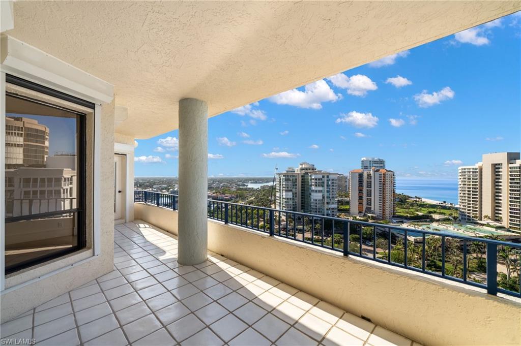 4451 Gulf Shore Boulevard North, Unit 2002 Naples, FL 34103 - Photo 33 of 36 a view of city from balcony