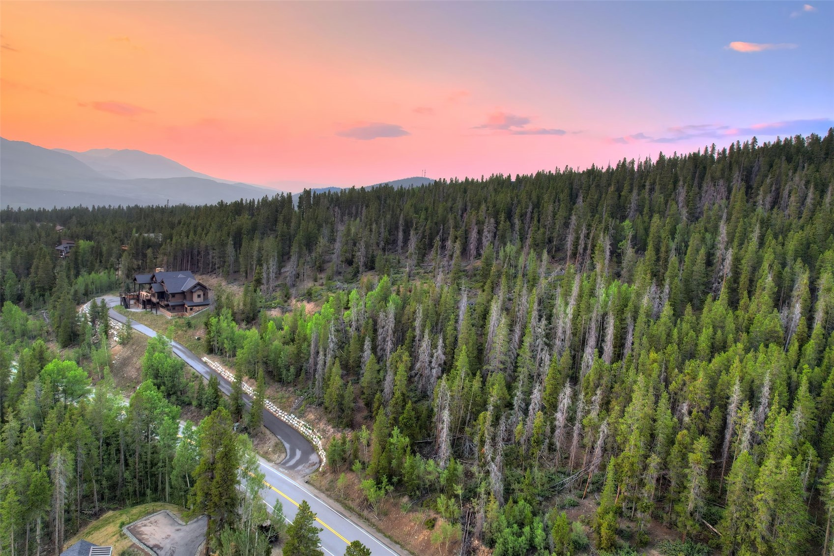 2211 Boreas Pass Road Breckenridge, CO 80424 - Photo 13 of 20 a view of a city with lush green forest
