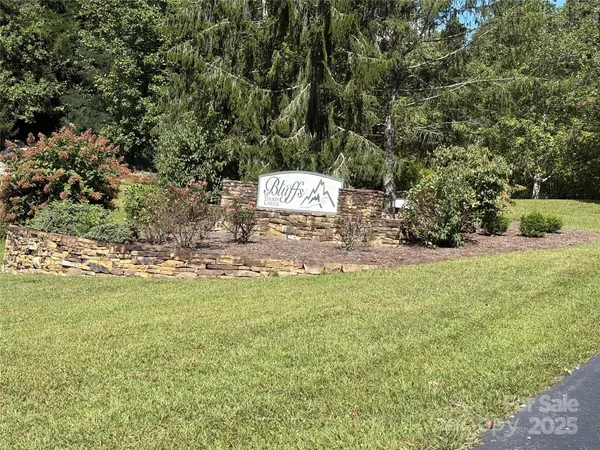 a view of a yard with an trees